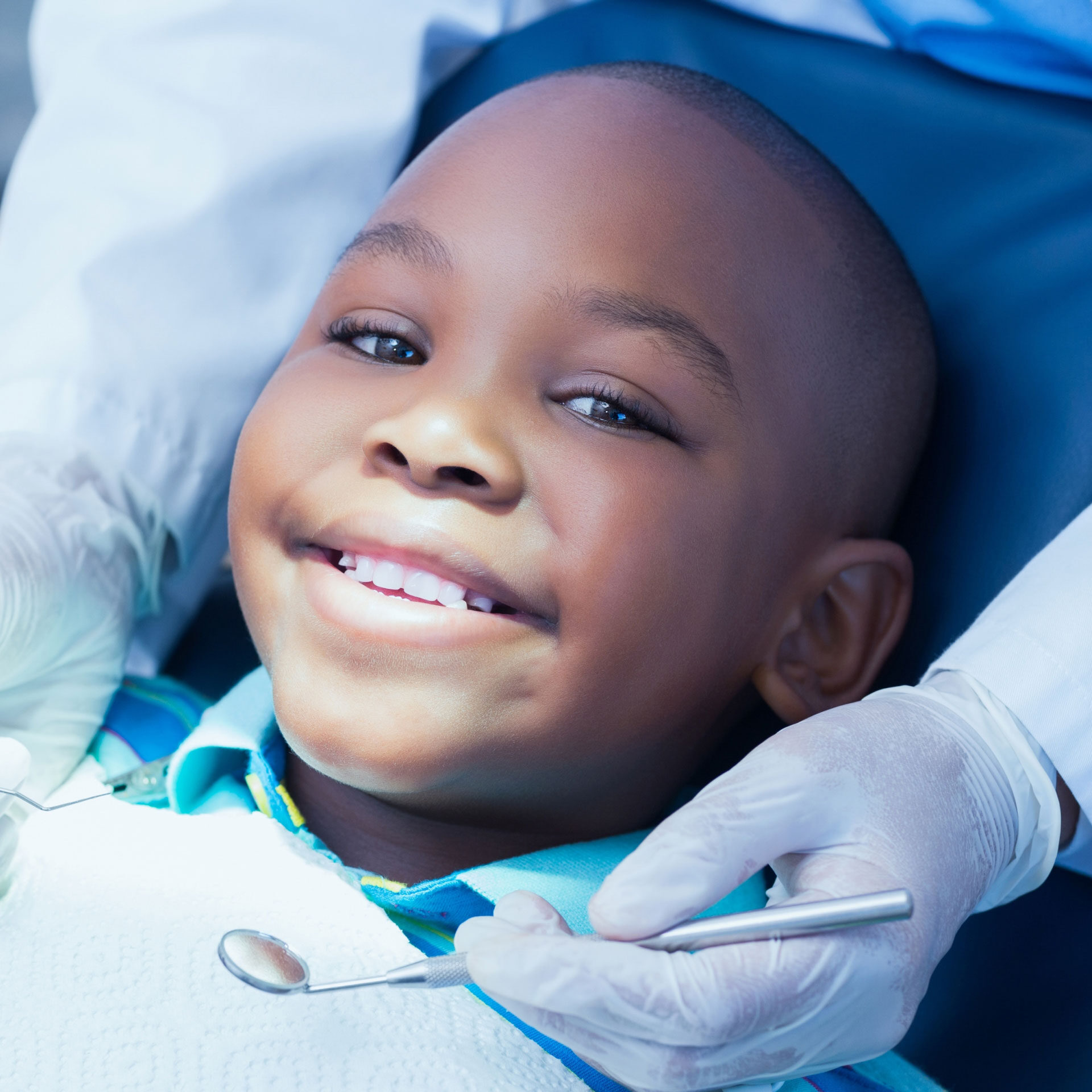 happy child having dental exam